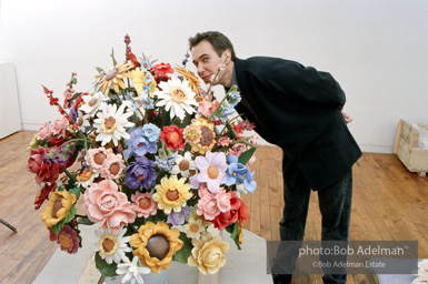 Jeff Koons with Large Vase of Flowers.  