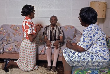 Love thy neighbor: A visiting prayer band prays with a blind parishioner,  Mantua,  Alabama  1983