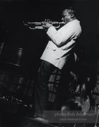 Nonchalantly,  the jazz great Miles Davis turns away from the audience at the Village Vanguard,  New York City 1959