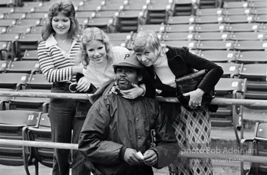 Celeb: Fans pose for a photo with Pittsburgh Pirates pitcher Dock Ellis before a game at Three Rivers Stadium,
Pittsburgh, Pennsylvania.  1975