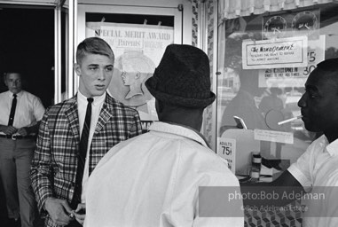 Stand back: a segregated movie theater, Tallahassee, Florida.  1964