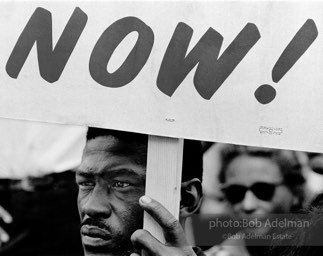 Redemption: Protestor demands the promise of full equality promised in the 13, 14, and, 15th amendments at the assembly at the Washington Monument.  Washington, D.C. August 28, 1963.