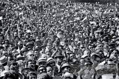 Amen, brother: enthusiastic march participants as King speaks, Washington, D.C.  1963-


“As King made his urgent call to the nation for action, spontaneously chanting his never-to-be-forgotten dream, his plea was answered by a rising crescendo of roars, cheers and thunderous clapping. By the power and urgency of his appeal, the mass and unity of his supporters, you just knew ‘His truth is marching on.’”