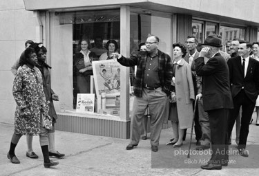 Words can wound, and the hecklers know it as they insult two black women who are part of a voting rights drive,  Selma,  Alabama.  1965