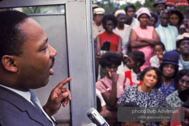 Getting out the vote, Dr. King travels throughout the south urging his bretheren to take advantage of the newly enacted Voting Rights act, Camden, Alabama. 1966