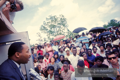 Getting out the vote, Dr. King travels throughout the south urging his bretheren to take advantage of the newly enacted Voting Rights act, Camden, Alabama. 1966