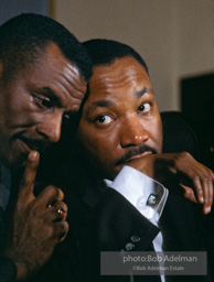 Martin Luther King confers with Rev. Fred Shuttlesworth. Selma, Alabama. 1965