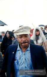 Martin Luther King in the rain about to enter Montgomery on the Selma to Montgomery march. 1965