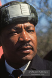 Martin Luther King, wearing a borrowed hat, on the Selma to Montgomery march, Alabama, 1965