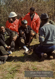 A a resting point during the Selma to Montgomery march, Dr. King changes socks. Alabama. 1965