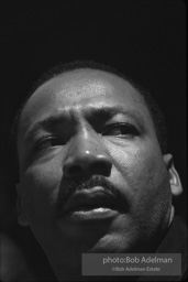 Martin Luther King in a quiet moment as he prepares to speak  in Montgomery,  Alabama.  1965