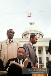 Martin Luther King prepares to speak at Montgomery, Alabama. 1965