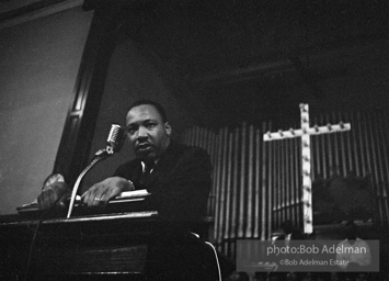 During a mass meeting at the 16th Street Baptist Church, King urges his supporters to join the demonstrations,  Birmingham,  Alabama.  1963