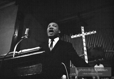 During a mass meeting at the 16th Street Baptist Church, King urges his supporters to join the demonstrations,  Birmingham,  Alabama.  1963