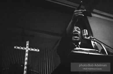 During a mass meeting at the 16th Street Baptist Church, King urges his supporters to join the demonstrations,  Birmingham,  Alabama.  1963