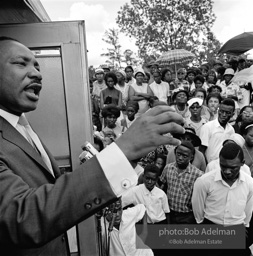 Getting out the vote, Dr. King travels throughout the south urging his bretheren to take advantage of the newly enacted Voting Rights act, Camden, Alabama. 1966