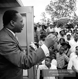 Getting out the vote, Dr. King travels throughout the south urging his bretheren to take advantage of the newly enacted Voting Rights act, Camden, Alabama. 1966