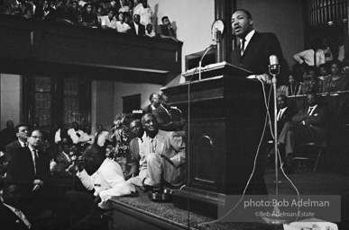 During a mass meeting at the 16th Street Baptist Church, King urges his supporters to join the demonstrations,  Birmingham,  Alabama.  1963