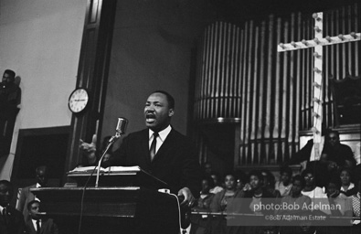 During a mass meeting at the 16th Street Baptist Church, King urges his supporters to join the demonstrations,  Birmingham,  Alabama.  1963