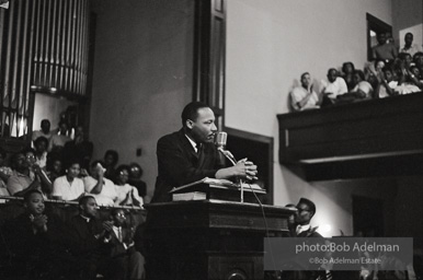 During a mass meeting at the 16th Street Baptist Church, King urges his supporters to join the demonstrations,  Birmingham,  Alabama.  1963