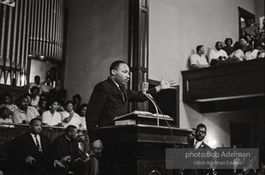 During a mass meeting at the 16th Street Baptist Church, King urges his supporters to join the demonstrations,  Birmingham,  Alabama.  1963