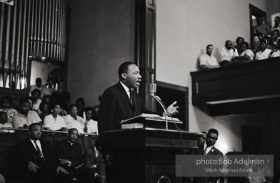 During a mass meeting at the 16th Street Baptist Church, King urges his supporters to join the demonstrations,  Birmingham,  Alabama.  1963