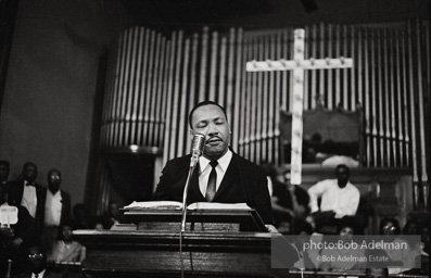 During a mass meeting at the 16th Street Baptist Church, King urges his supporters to join the demonstrations,  Birmingham,  Alabama.  1963