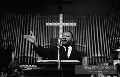 During a mass meeting at the 16th Street Baptist Church, King urges his supporters to join the demonstrations,  Birmingham,  Alabama.  1963