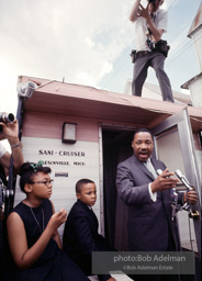 Getting out the vote, Dr. King travels throughout the south urging his bretheren to take advantage of the newly enacted Voting Rights act, Camden, Alabama. 1966