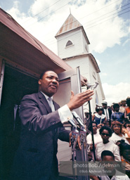 Getting out the vote, Dr. King travels throughout the south urging his bretheren to take advantage of the newly enacted Voting Rights act, Camden, Alabama. 1966