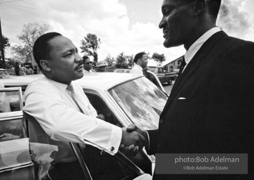 Getting out the vote, Dr. King travels throughout the south urging his bretheren to take advantage of the newly enacted Voting Rights act, Camden, Alabama. 1966