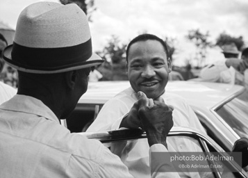 Getting out the vote, Dr. King travels throughout the south urging his bretheren to take advantage of the newly enacted Voting Rights act, Camden, Alabama. 1966