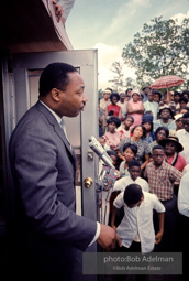 Getting out the vote, Dr. King travels throughout the south urging his bretheren to take advantage of the newly enacted Voting Rights act, Camden, Alabama. 1966