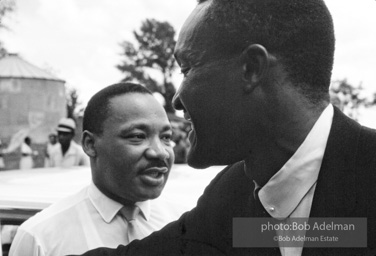 Getting out the vote, Dr. King travels throughout the south urging his bretheren to take advantage of the newly enacted Voting Rights act, Camden, Alabama. 1966