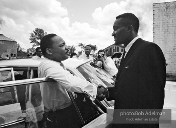 Getting out the vote, Dr. King travels throughout the south urging his bretheren to take advantage of the newly enacted Voting Rights act, Camden, Alabama. 1966