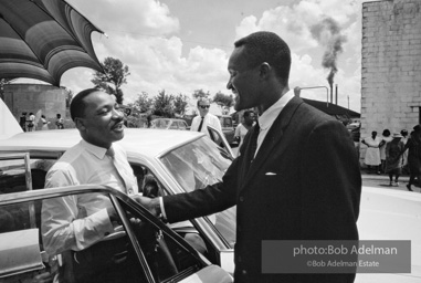 Getting out the vote, Dr. King travels throughout the south urging his bretheren to take advantage of the newly enacted Voting Rights act, Camden, Alabama. 1966