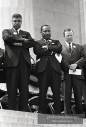 National Urban League Director Whitney Young Jr. (left) joins King to pledge allegiance at the beginning of the ceremony at the Lincoln Memorial, Washington,  1963
