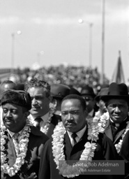 Martin Luther King crossing the Edmund Pettus bridge at the beginning of the Selma to Montgomery march, Selma Alabama, 1965.