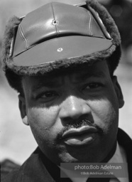 Martin Luther King, wearing a borrowed hat, on the Selma to Montgomery march, Alabama, 1965