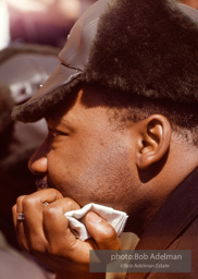 Martin Luther King, wearing a borrowed hat, on the Selma to Montgomery march, Alabama, 1965