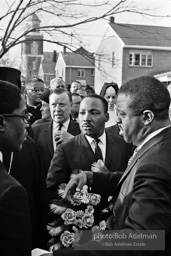 Dr. King carrying a wreath, leads a memorial march for civil-rights crusader, Rev. James Reeb.Selma, Alabama. 1965