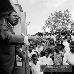 Getting out the vote, Dr. King travels throughout the south urging his bretheren to take advantage of the newly enacted Voting Rights act, Camden, Alabama. 1966