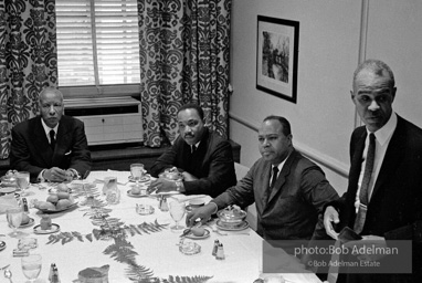 A. Phillip Randolph, Martin Luther King Jr., and James Farmer, Civil rights leaders meet at a private lunch to plan the march on Washington. New York City, Summer, 1963.