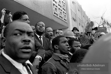 Demonstrators conclude  in front of court house with the singing of 