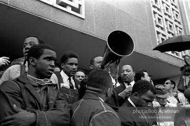 Rev. Abernathy speaking in front of Selma city hall protesting the denial of the right to vote to black citizens of Selma, Alabama. 1965