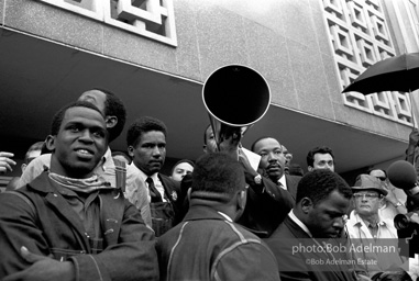 Rev. Abernathy speaking in front of Selma city hall protesting the denial of the right to vote to black citizens of Selma, Alabama. 1965