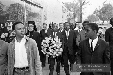 Dr. King carrying a wreath, leads a memorial march for civil-rights crusader, Rev. James Reeb.Selma, Alabama. 1965