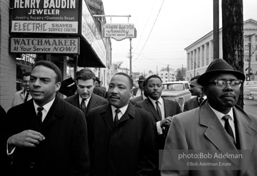 A triumphant King leaves the federal courthouse  after a federal judge, Frank Johnson, rules that the Selma-to-Montgomery march can proceed, Montgomery,  Alabama.  1965