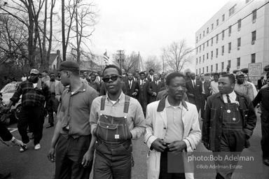 Dr. King leads a protest march around the state capital in Montgomery Alabama protesting the treatment of black demonstrators and voter applicants in Selma, Alabama prior to the Selma to Montgomery march. Montgomery, Alabama. 1965.