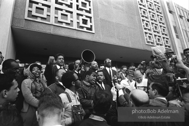 Rev. Abernathy speaking in front of Selma city hall protesting the denial of the right to vote to black citizens of Selma, Alabama. 1965